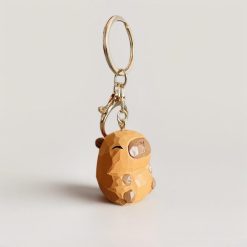 moc khoa go capybara baby 4 5x3 cm cham tay 5