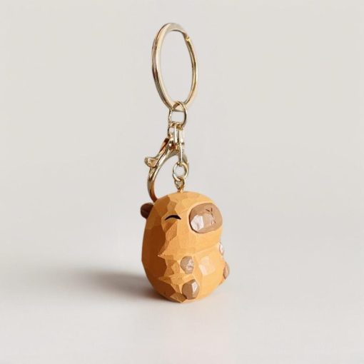 moc khoa go capybara baby 4 5x3 cm cham tay 5