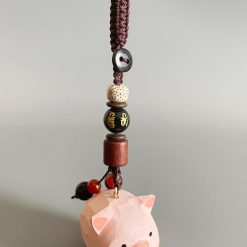 moc khoa go heo con hong 4x3cm 5