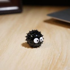 Tượng hạt bụi thủy tinh mắt to 2 cm để bàn
